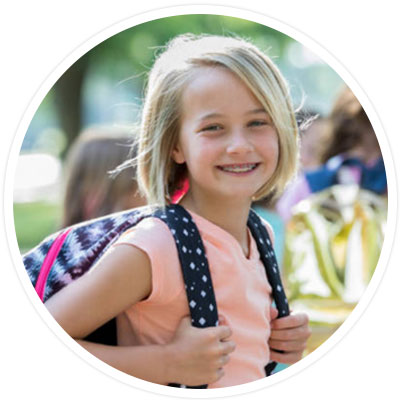 Photo of a girl with braces who started orthodontic treatment.